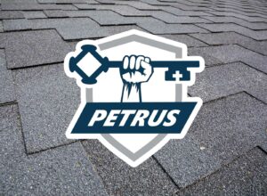 Petrus Roofing logo on top of shingles