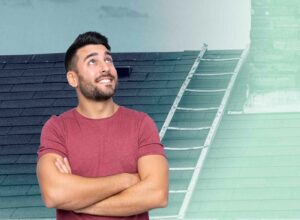 Man in foreground smiles when he thinks of his new roof